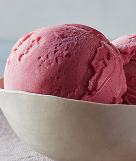 Scoops of Haagen-Dazs raspberry sorbet in a bowl