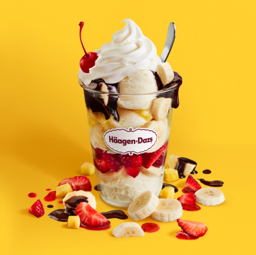 Banana Split Dazzler Vanilla Ice Cream layered with bananas, pineapple, strawberry and hot fudge topped with whipped cream and a cherry. Served with toppings.