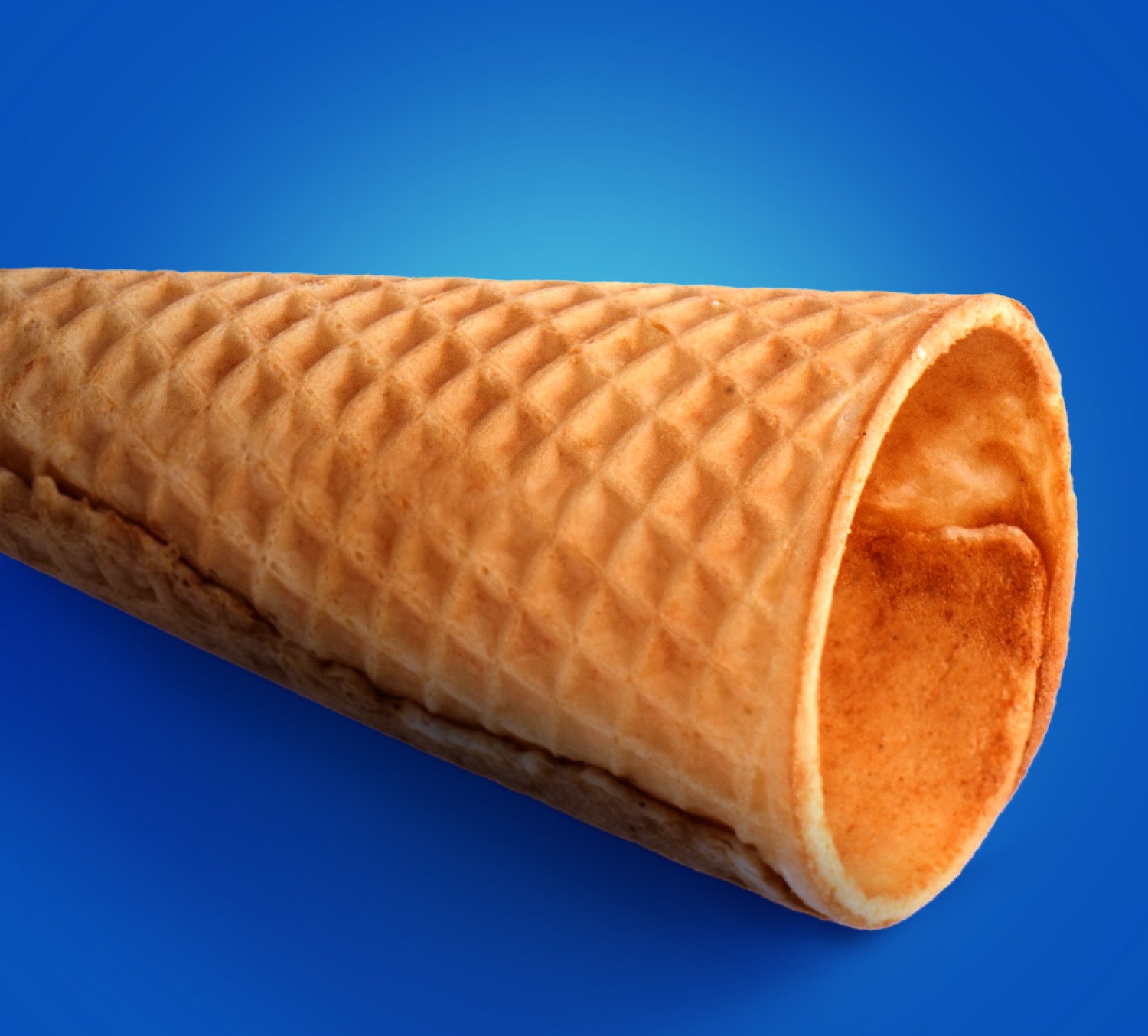 A waffle cone without any ice cream in it. 