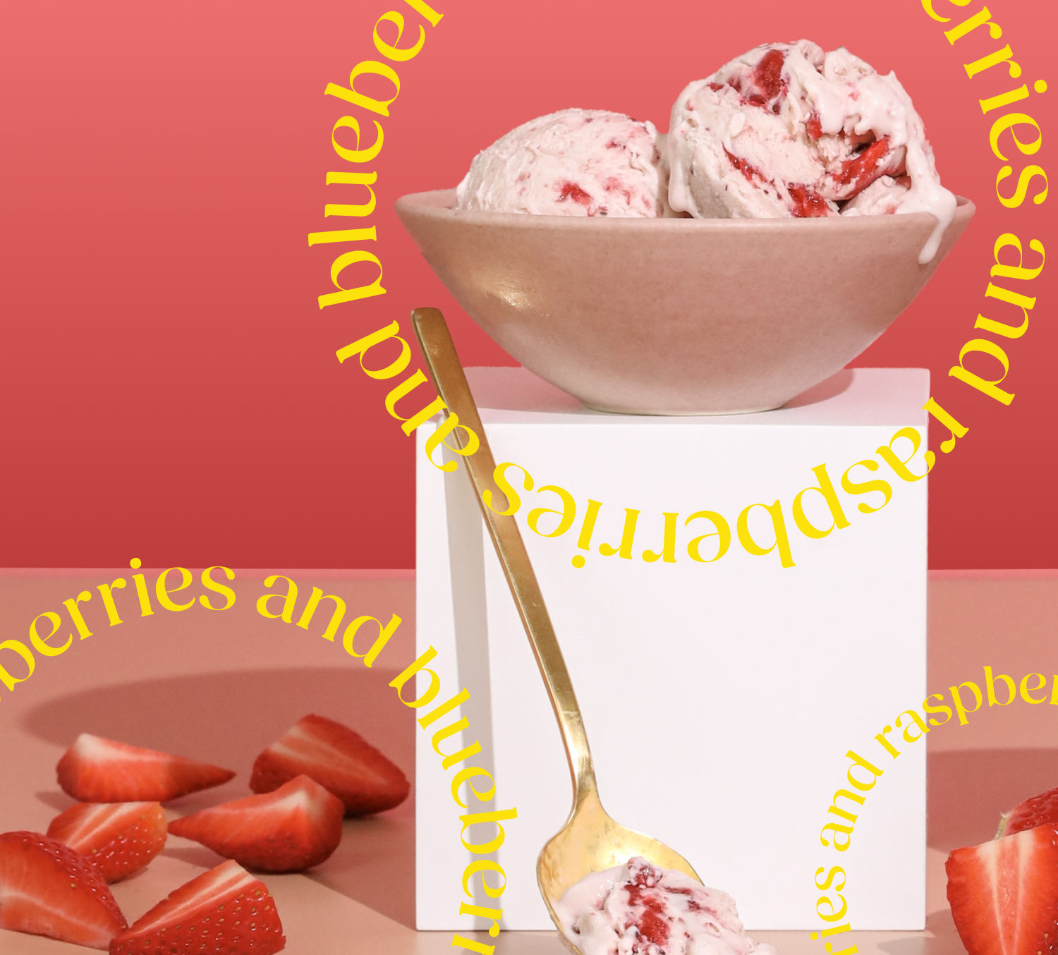 A bowl with two scoops of strawberry ice cream. 