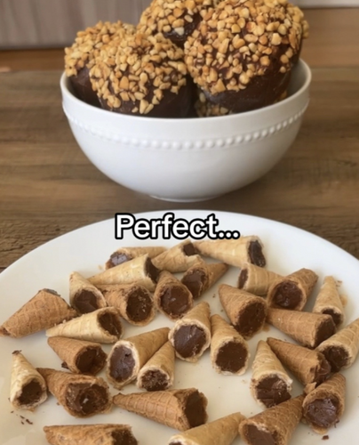 A plate full of the chocolate filled ends of Drumstick ice cream cones. 
