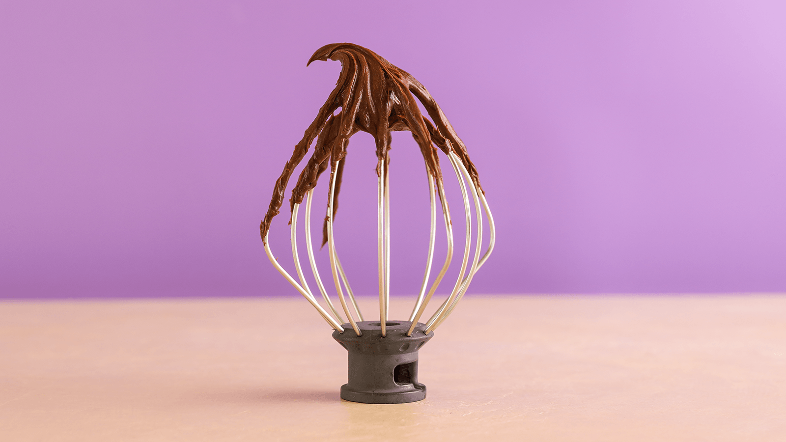 Mixer with chocolate on it.